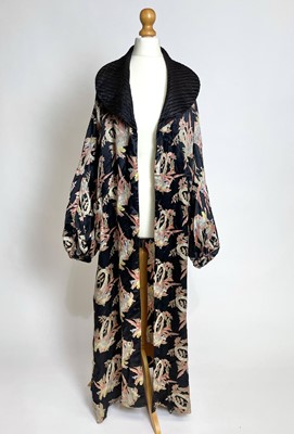 Lot 821 - A 1920s lounge robe printed with lucky horseshoes