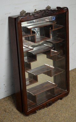 Lot 14 - A Chinese hardwood wall mounting display shelf