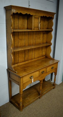 Lot 54 - A small reproduction oak dresser