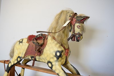 Lot 37 - A vintage rocking horse.