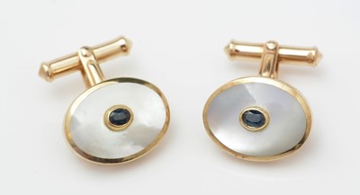 Lot 369 - A pair of sapphire and mother-of-pearl cufflinks