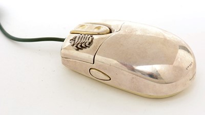 Lot 556 - An Elizabeth II silver Millennium Bug computer mouse