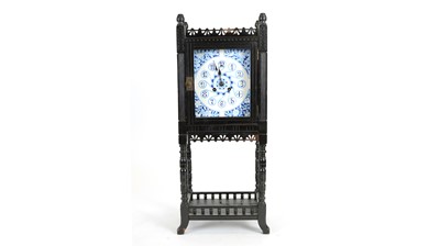 Lot 1205 - An aesthetic movement ebonised clock.