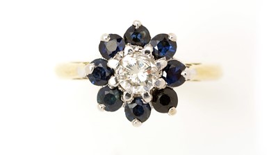 Lot 376 - A sapphire and diamond cluster ring