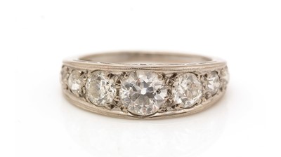 Lot 378 - A seven stone diamond ring