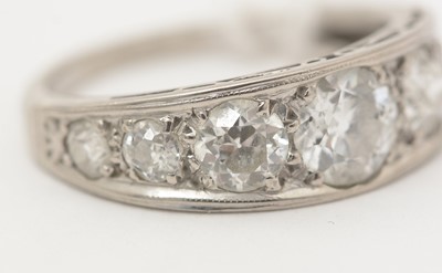 Lot 378 - A seven stone diamond ring
