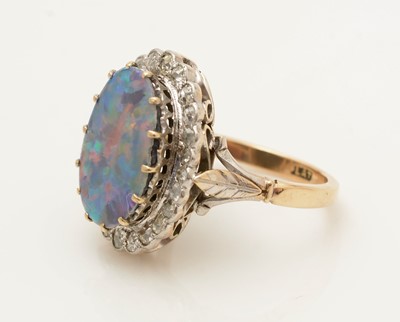 Lot 381 - An opal doublet and diamond cluster ring