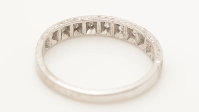 Lot 391 - A half hoop diamond ring