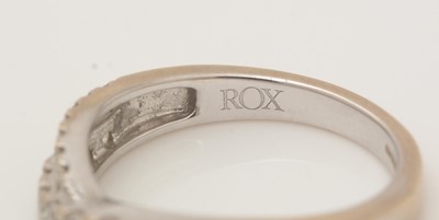 Lot 397 - A diamond half hoop eternity ring, by ROX