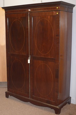 Lot 69 - A 19th Century inlaid mahogany wardrobe.