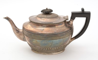 Lot 221 - A Victorian silver teapot.