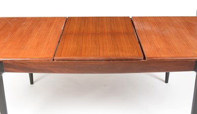 Lot 307 - A.Younger Ltd 1960's teak and ebonised extending dining table.