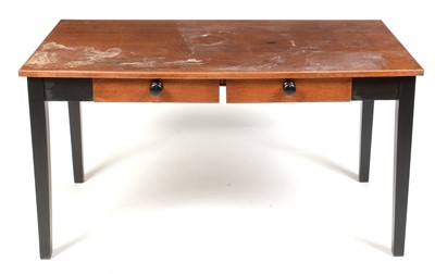 Lot 308 - A mid Century oak and ebonised desk.