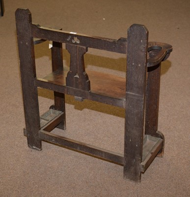 Lot 39 - An early 20th Century carved oak hall seat/stick stand.