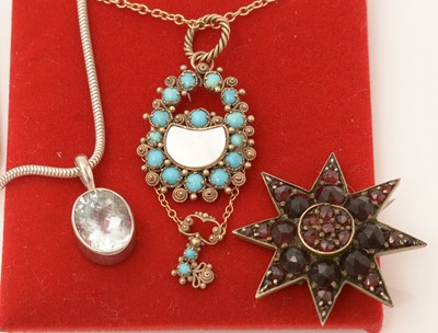 Lot 105 - Aquamarine pendant, garnet brooch and another pendant.