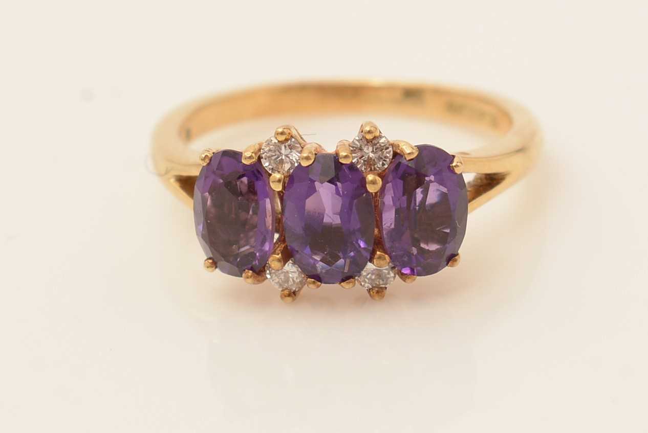 Lot 109 - An amethyst and diamond ring