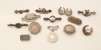 Lot 120 - A collection of late 19th/early 20th Century silver brooches.