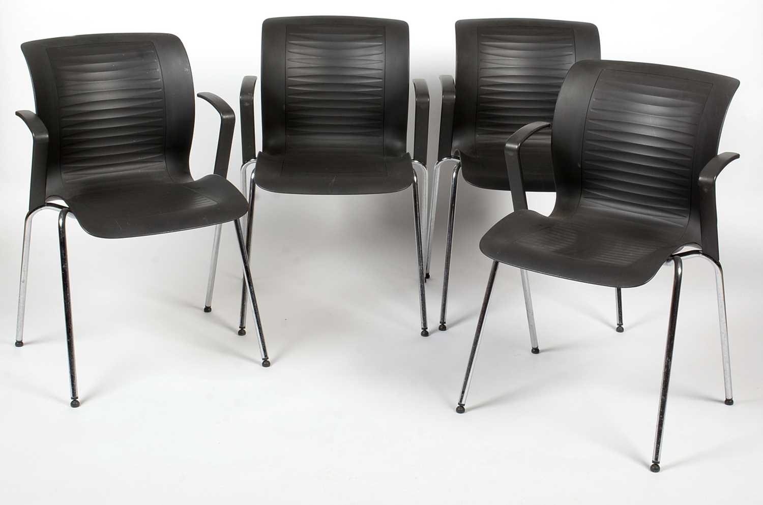 Lot 381 - Alfred Homann for Fritz Hansen: four stacking 'Ensemble' armchairs