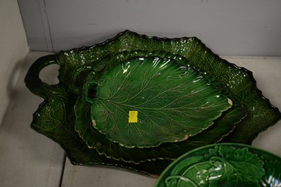 Lot 231 - A selection of green Majolica leaf motif dishes.