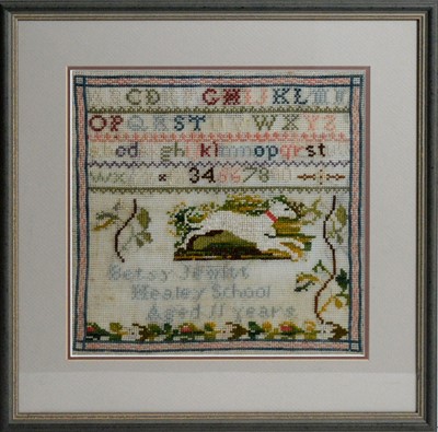 Lot 804 - A Victorian alphabet needlework sampler by Betsy Jewitt