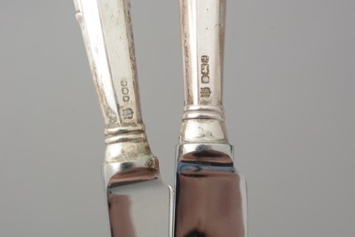 Lot 560 - A set of silver mounted table knives, by Cooper Brothers & Sons