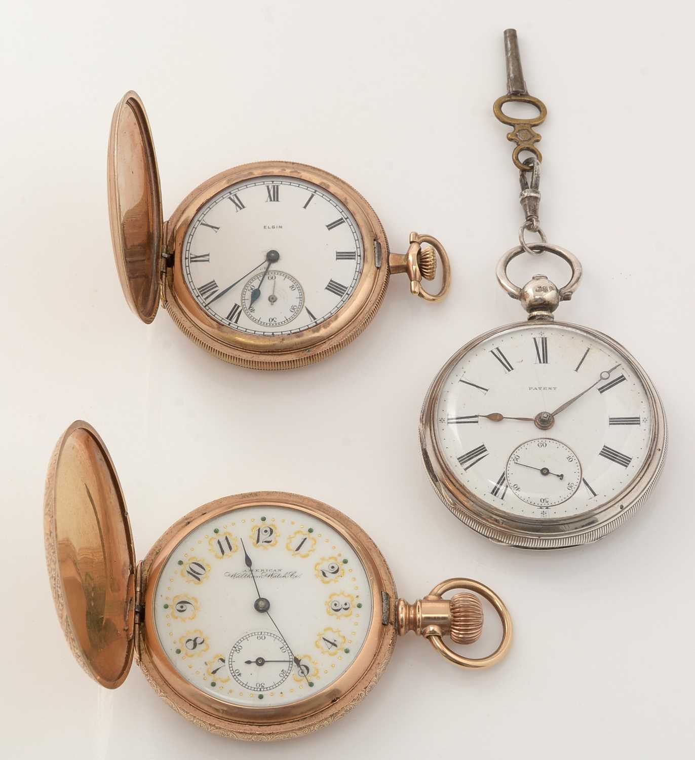 Lot 254 - A silver pocket watch and two gilt cased hunter pocket watches.