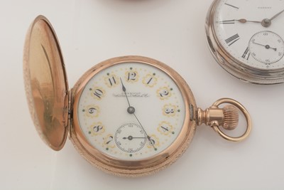 Lot 254 - A silver pocket watch and two gilt cased hunter pocket watches.