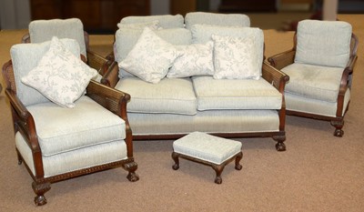 Lot 32 - An early 20th C carved 'Harlequin' six-piece lounge suite.