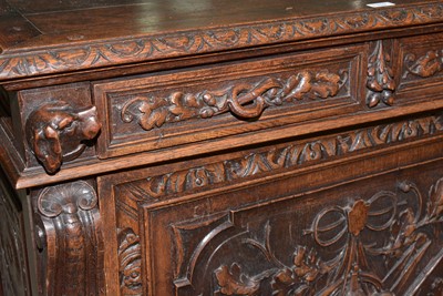 Lot 1310 - A richly carved Victorian oak side/pier cabinet with a sporting theme.