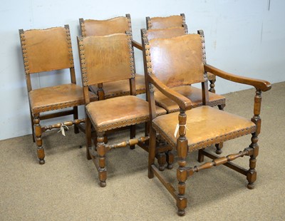 Lot 38 - A set of six light oak tan leather-covered dining chairs.