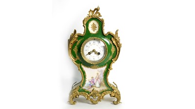 Lot 1140 - Vincenti & Cie: a green Paris-style porcelain and gilt bronze mantel clock.