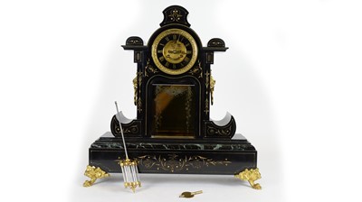 Lot 1141 - Japy Freres: a French black marble mantel clock.