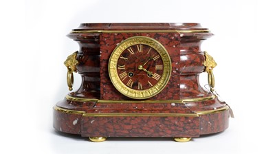 Lot 1145 - L. Charvet, Lyon and Japy Freres: a 19th Century red marble mantel clock.