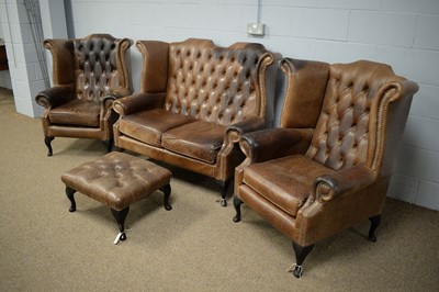 Lot 3 - A 20th Century button upholstered and studded four-piece lounge suite.