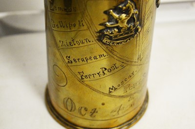 Lot 511 - A WWI era brass trench art shell case vase