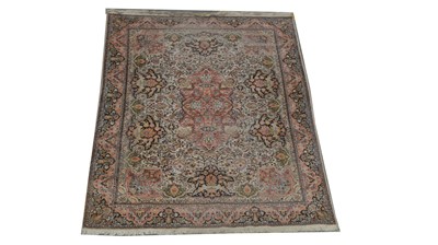 Lot 1091 - A silk North West Persian carpet.