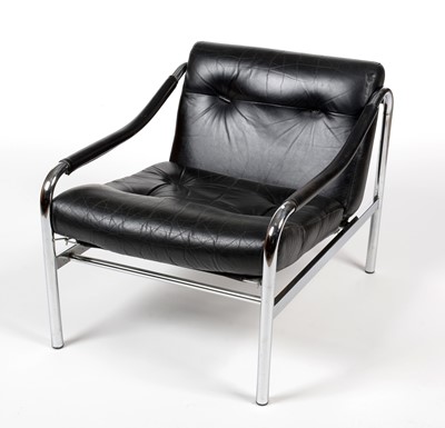 Lot 384 - Tim Bates for Pieff: a black leather and chrome metal armchair