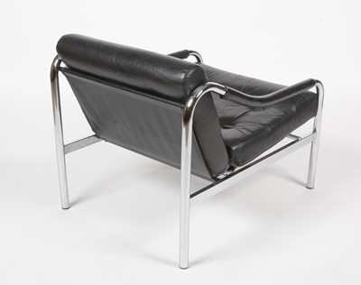 Lot 384 - Tim Bates for Pieff: a black leather and chrome metal armchair