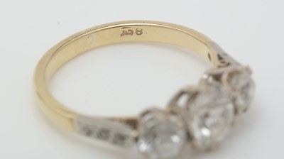 Lot 407 - A three-stone diamond ring