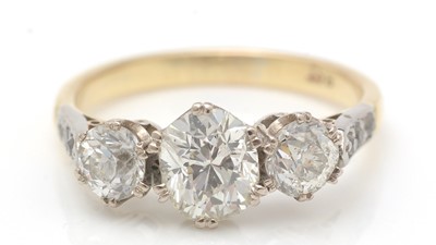 Lot 407 - A three-stone diamond ring