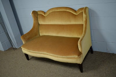 Lot 20 - An early 20th Century gold plush upholstered serpentine fronted settee.