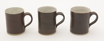 Lot 425 - Lucie Rie set of five coffee cans and saucers.
