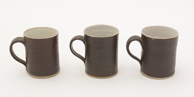 Lot 425 - Lucie Rie set of five coffee cans and saucers.