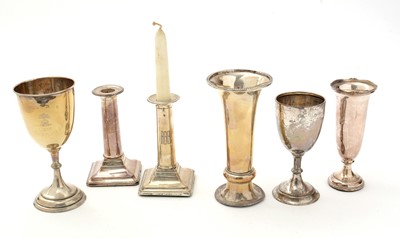 Lot 239 - A selection of silver vases, candlesticks and chalices