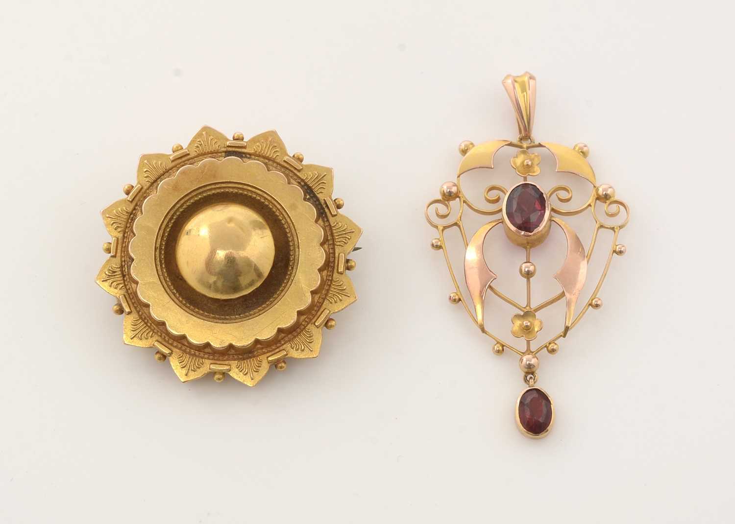 Lot 273 - An Edwardian pendant and a Victorian brooch