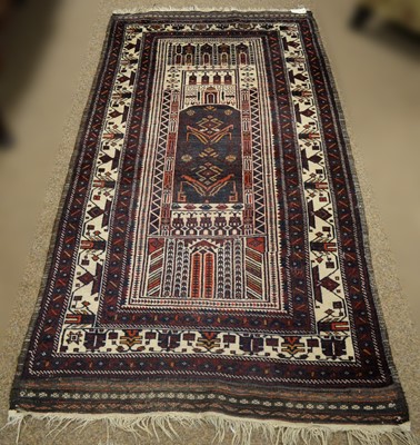 Lot 95 - Two Baluch prayer rugs and a Baluch carpet.