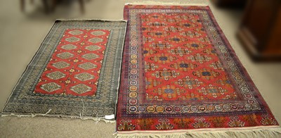 Lot 100 - A selection of Bokhara carpets