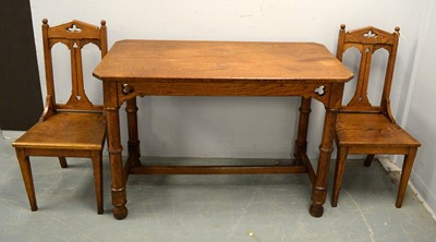 Lot 80 - Victorian oak side table together with a pair of similar chairs.