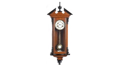 Lot 1208 - A late 19th Century Vienna walnut-cased wall clock.