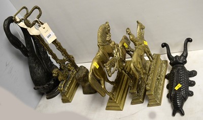 Lot 289 - A selection of brass and cast metal door stops.